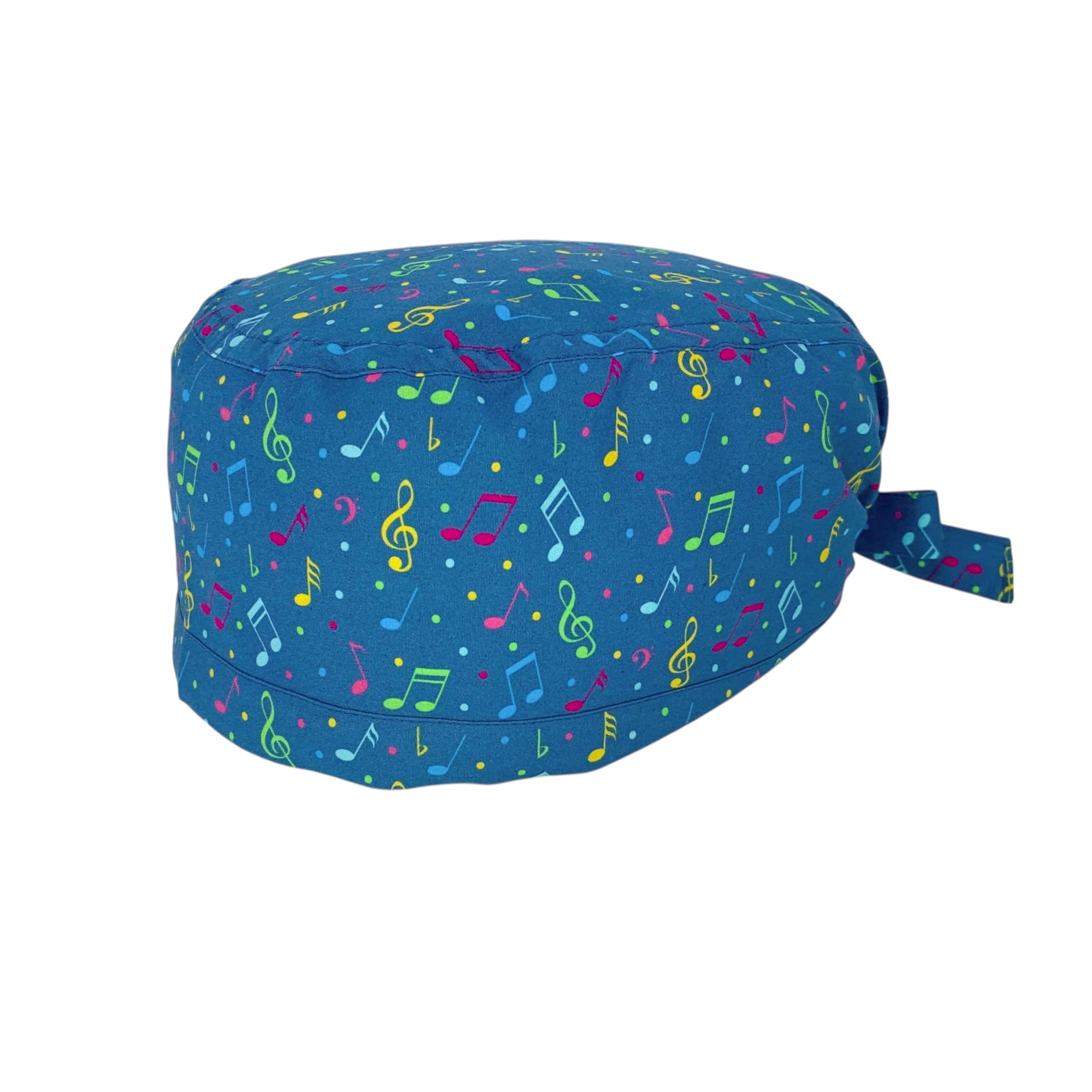 Cuffietta chirurgica con note musicali colorate sparse su sfondo blu medio