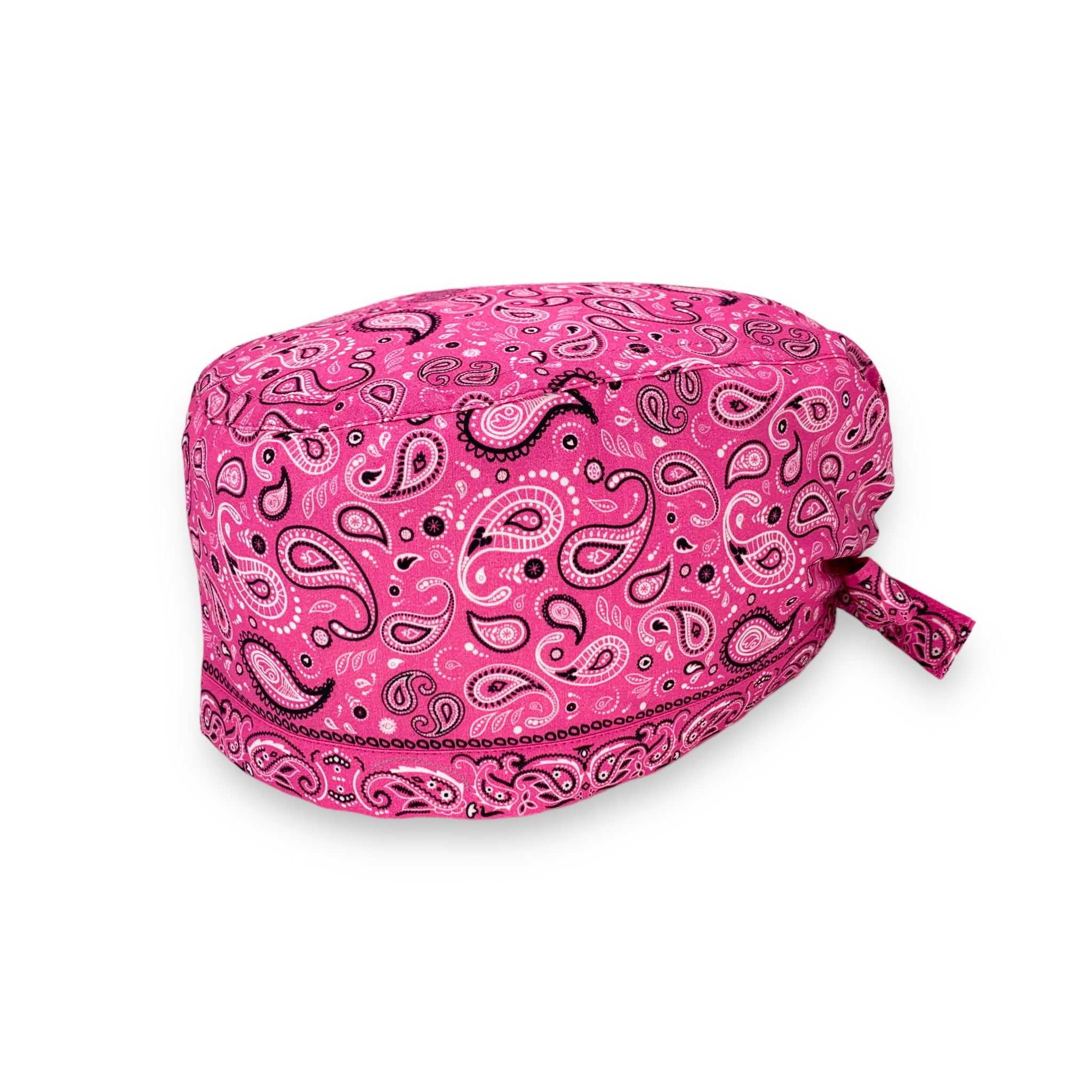 Una classica fantasia Paisley, perfettamente incorniciata dalla fascetta inferiore su sfondo fucsia