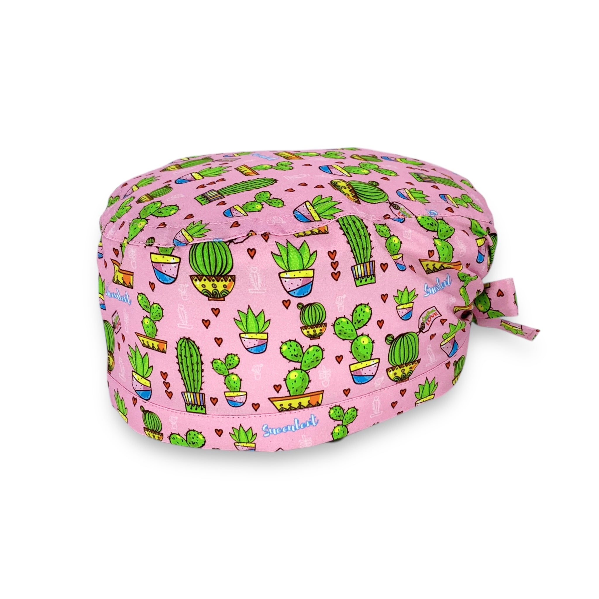 Deliziosi vasi con piante di cactus di varie forme e misure si alternano a piccoli cuoricini, come farne a meno? Sfondo rosa