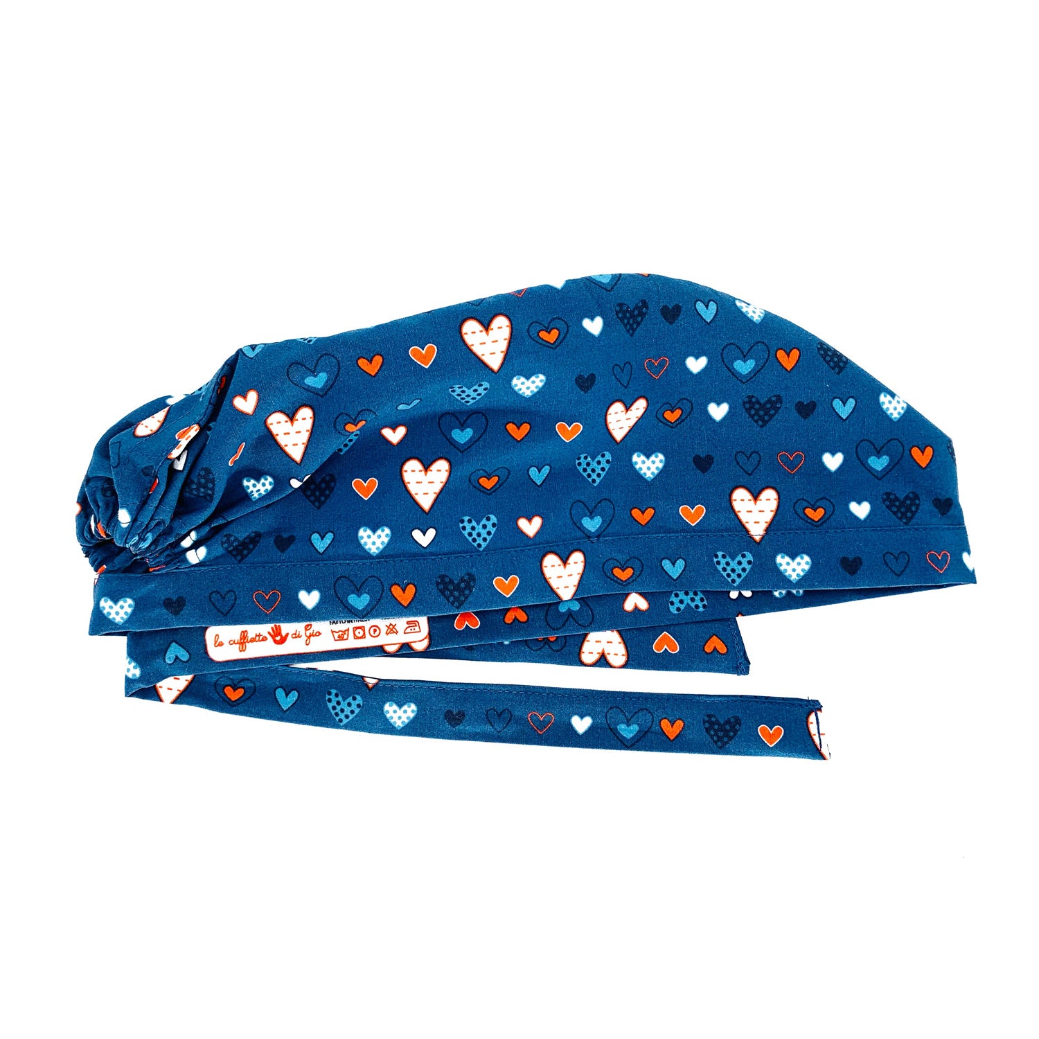 Cuoricini sparsi di forme diverse rossi, azzurri e bianchi su base blu medio