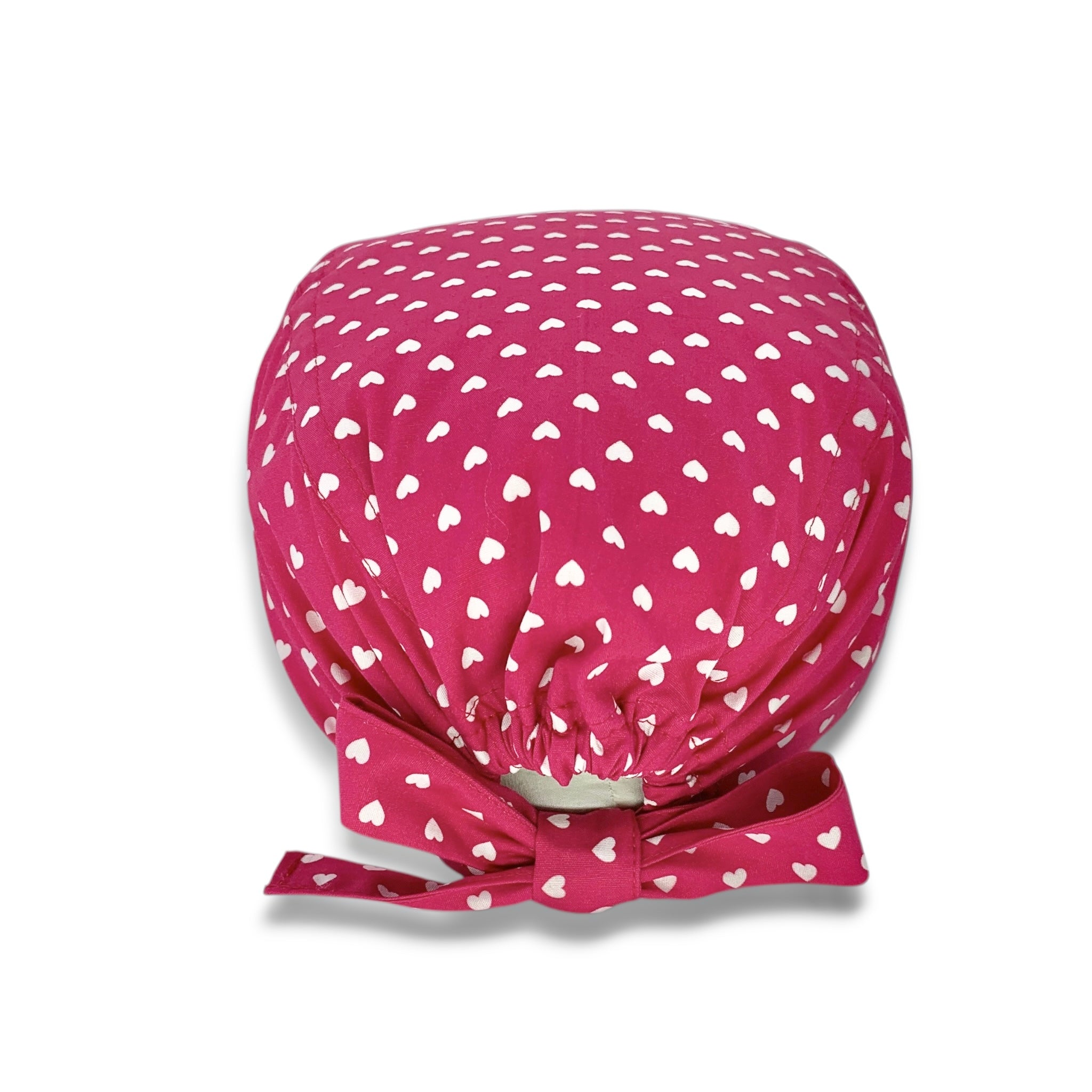 Piccoli cuoricini bianchi come pois su base magenta. Semplice ed elegante.