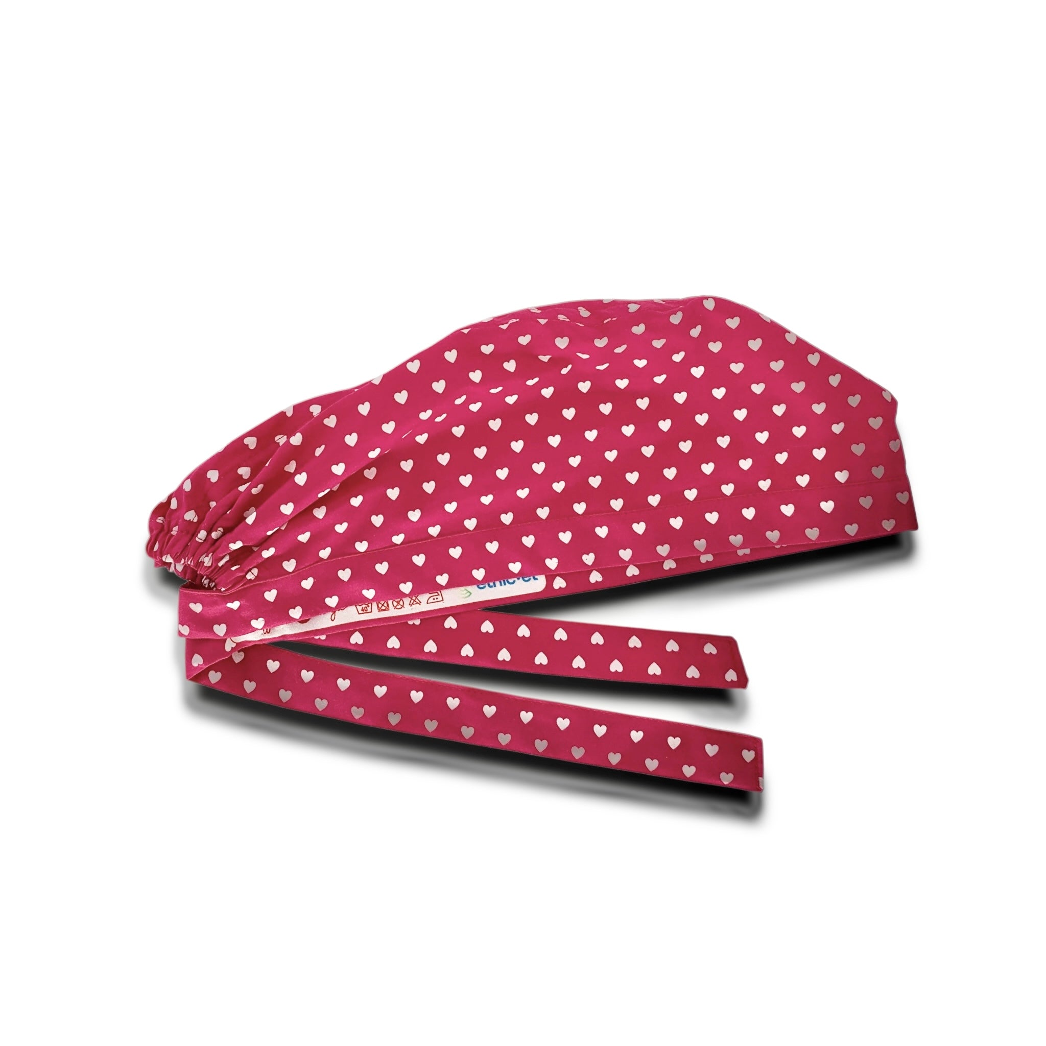 Piccoli cuoricini bianchi come pois su base magenta. Semplice ed elegante.