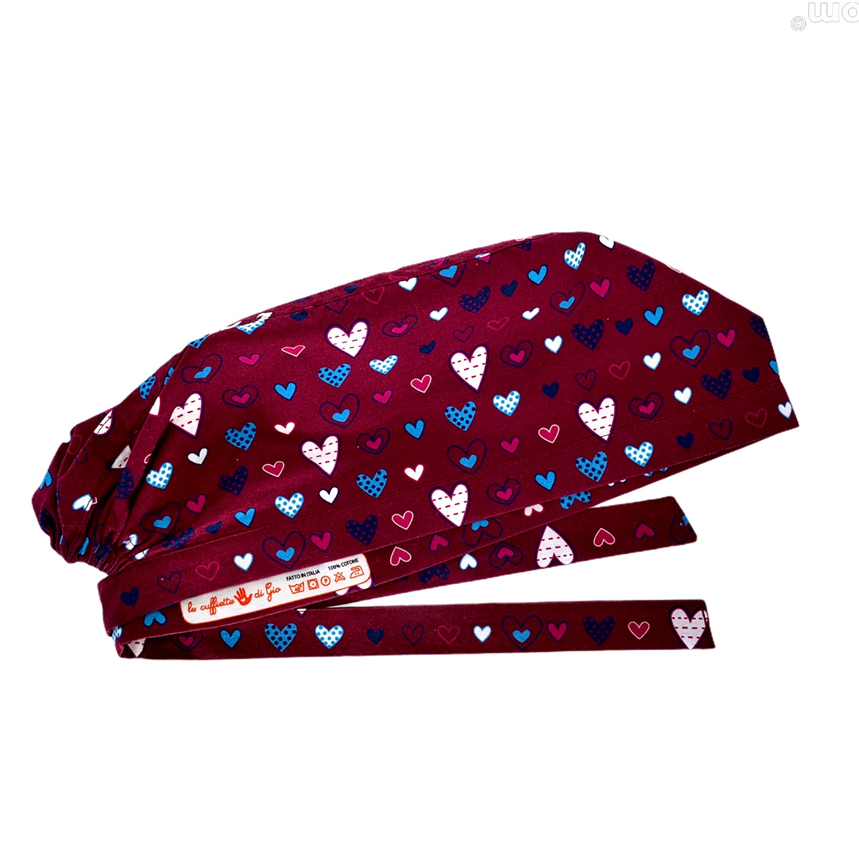 Cuoricini sparsi di forme diverse magenta bianchi e azzurri su base bordeaux