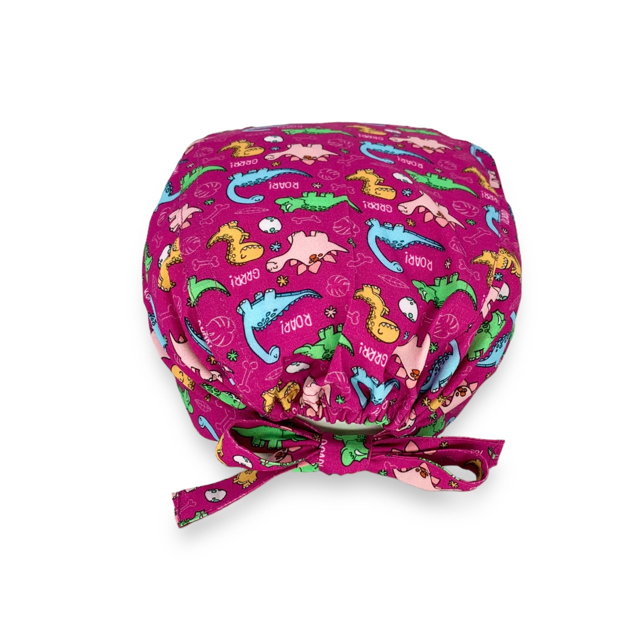 Tanti irresistibili dinosauri colorati su sfondo magenta per attirare l'attenzione dei tuoi piccoli pazienti pediatrici!