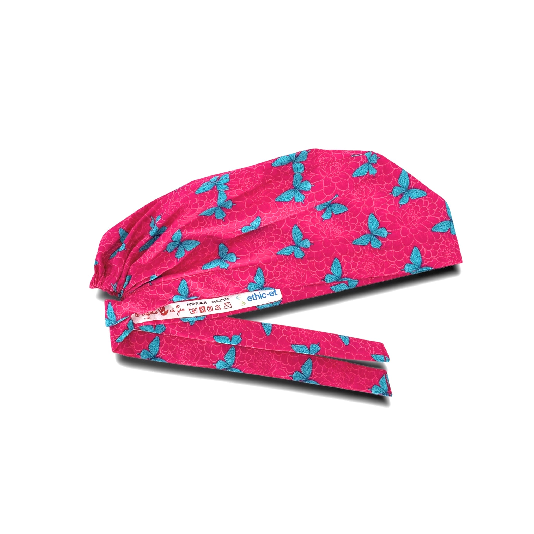 Un'elegantissima fantasia con dalie sfumate tono su tono e delicate farfalle a contrasto; farfalle verde menta su sfondo magenta