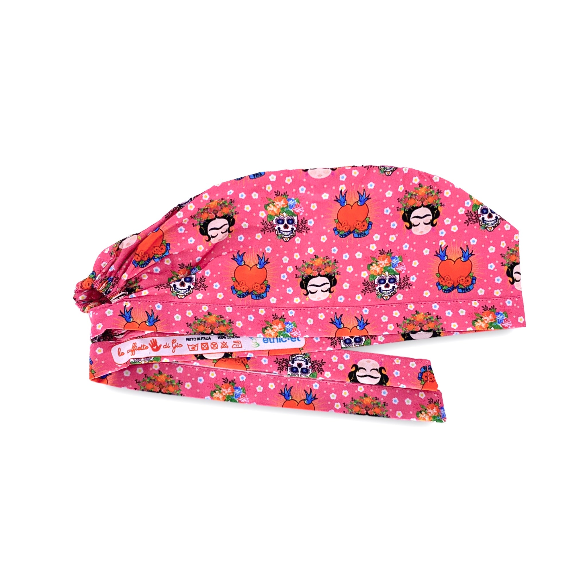 Cuffietta medica che rappresenta un volto iconico della storia dell'arte e della cultura mondiale, quello di Frida Khalo e alcuni simboli che rappresentano la sua storia, il teschio e la frase "Viva la Vida"