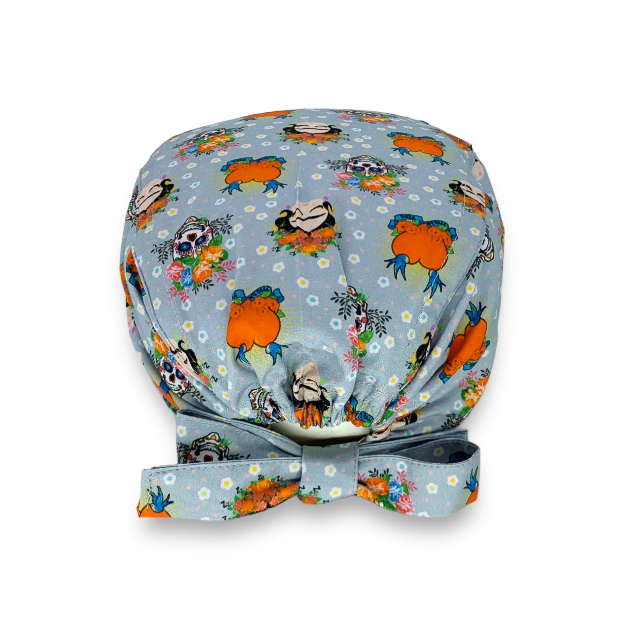 Cuffietta medica che rappresenta un volto iconico della storia dell'arte e della cultura mondiale, quello di Frida Khalo e alcuni simboli che rappresentano la sua storia, il teschio e la frase "Viva la Vida"