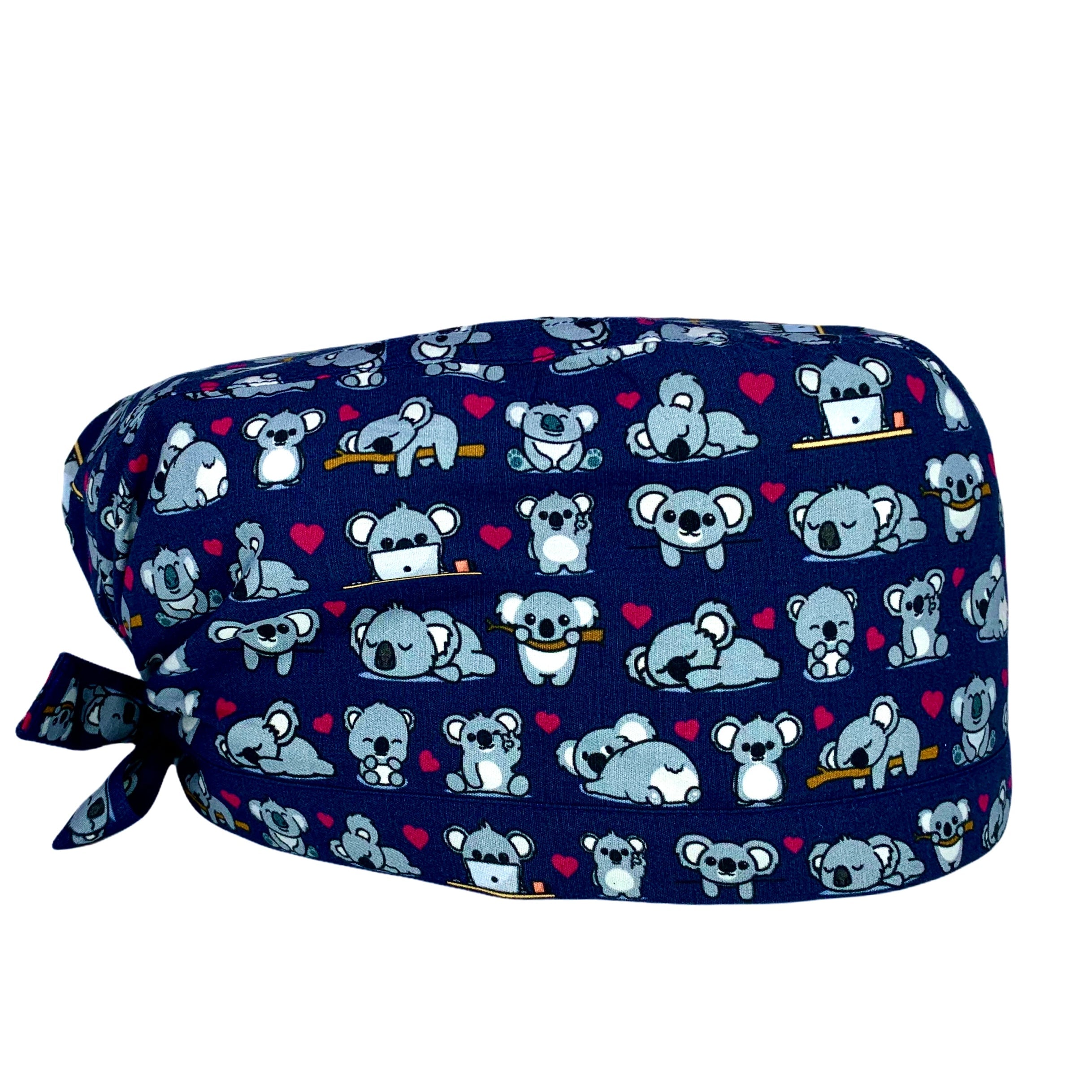 Un bestseller assoluto! Mille tenerissimi koala grigi e cuoricini magenta si sposano alla perfezione con il blu di sfondo che abbiamo scelto per illuminare il tuo outfit lavorativo