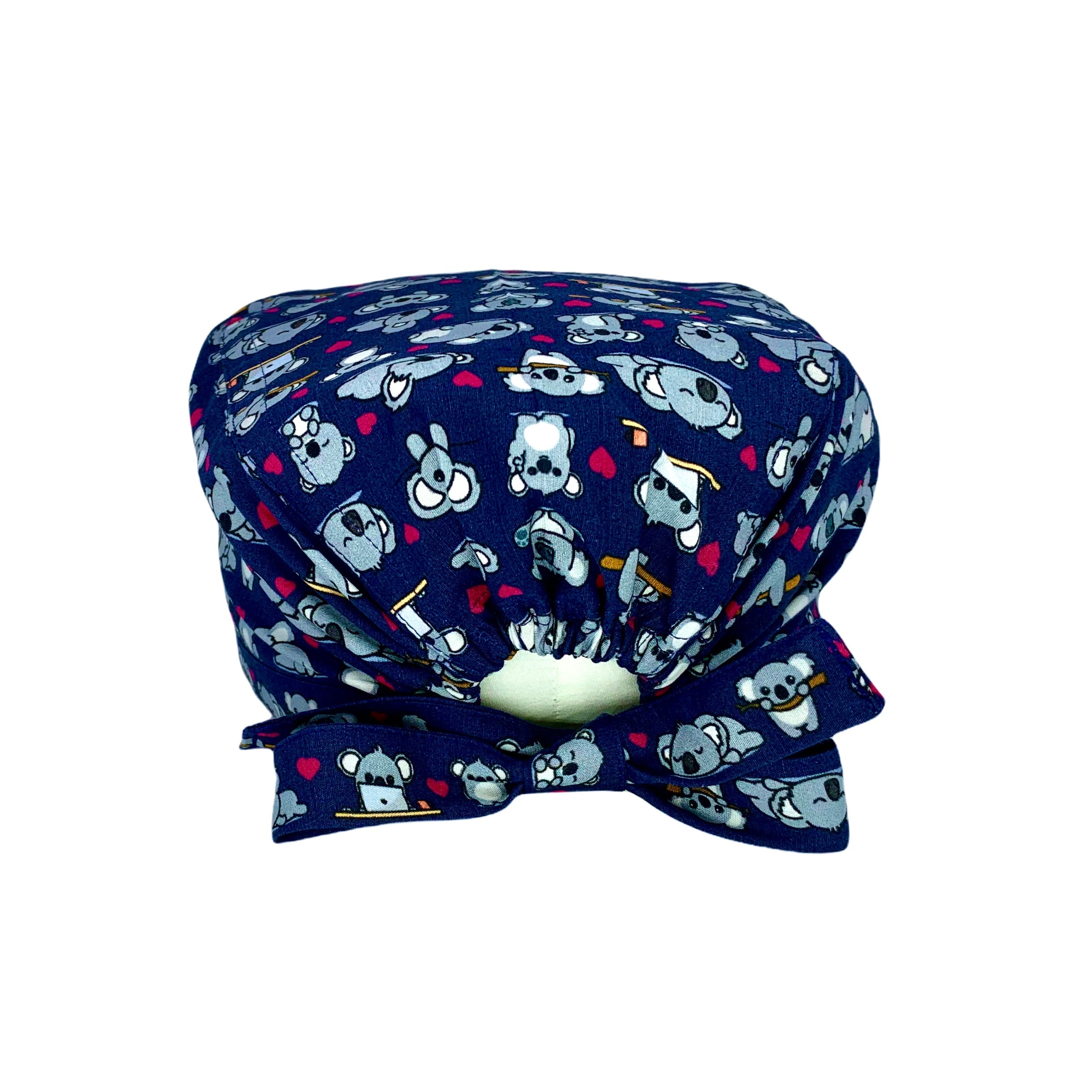 Un bestseller assoluto! Mille tenerissimi koala grigi e cuoricini magenta si sposano alla perfezione con il blu di sfondo che abbiamo scelto per illuminare il tuo outfit lavorativo