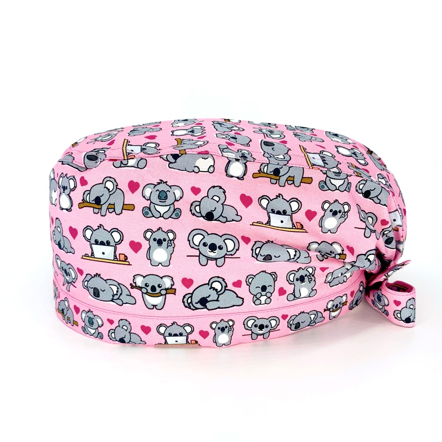 Un bestseller assoluto! Mille tenerissimi koala grigi e cuoricini magenta si sposano alla perfezione con il rosa di sfondo che abbiamo scelto per illuminare il tuo outfit lavorativo