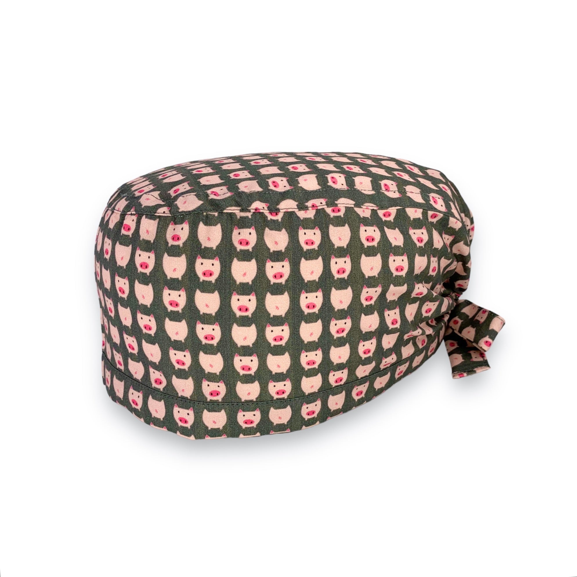 Tanti piccoli maialini rosa su sfondo grigio