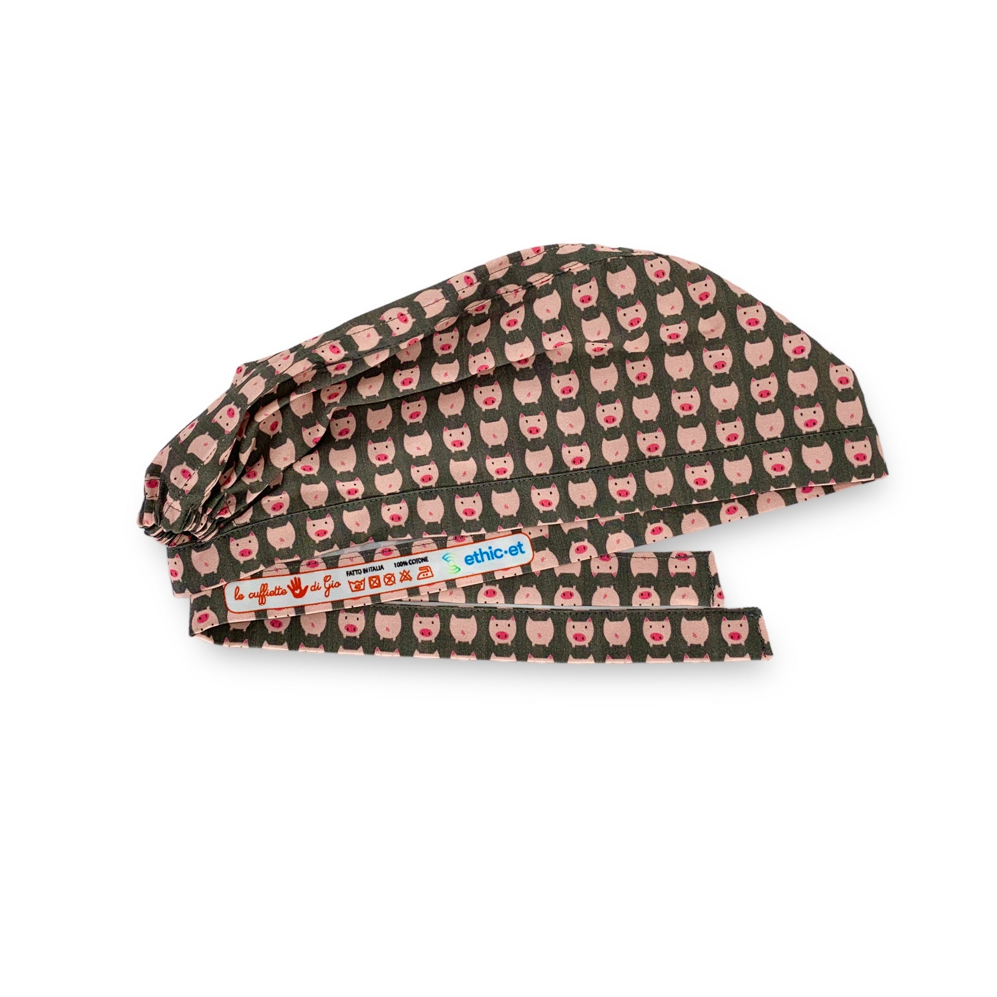 Tanti piccoli maialini rosa su sfondo grigio