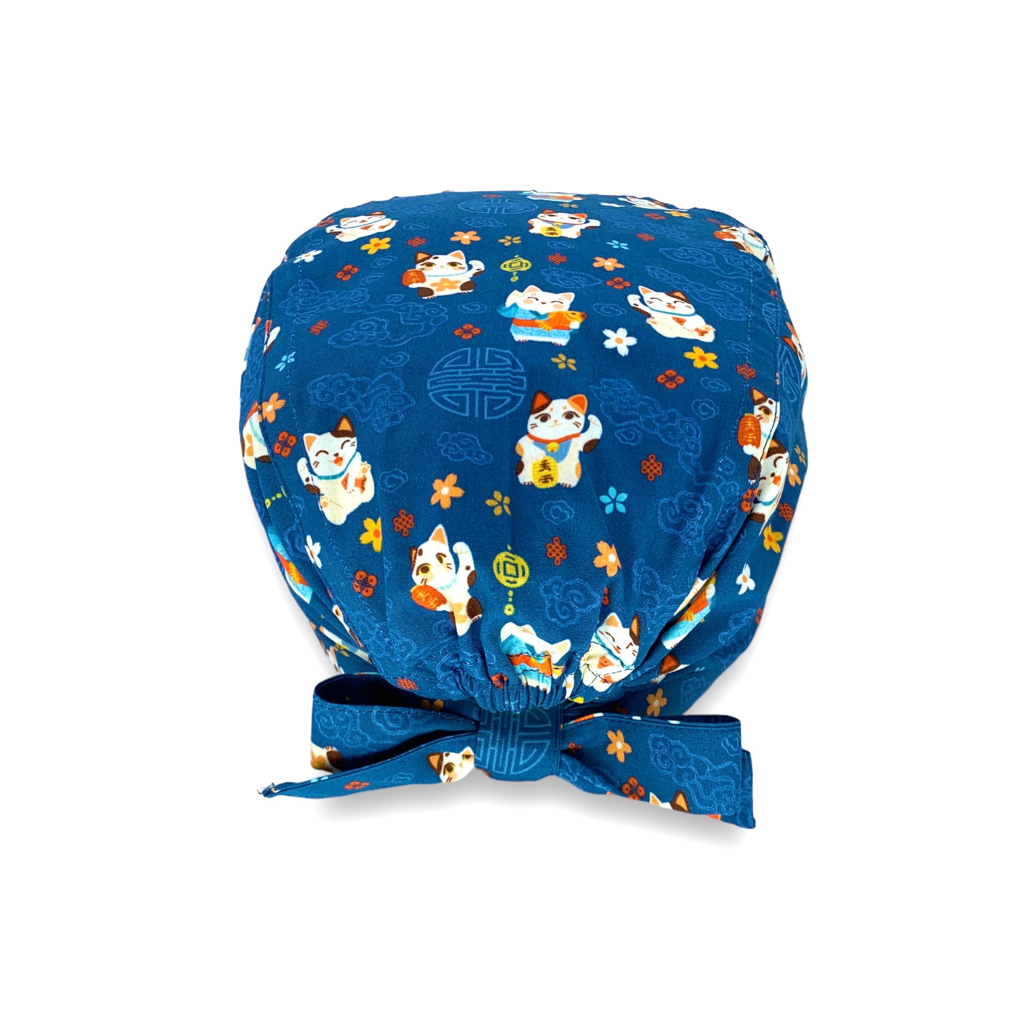 Il gatto portafortuna della tradizione orientale, con disegni in tema su sfondo blu