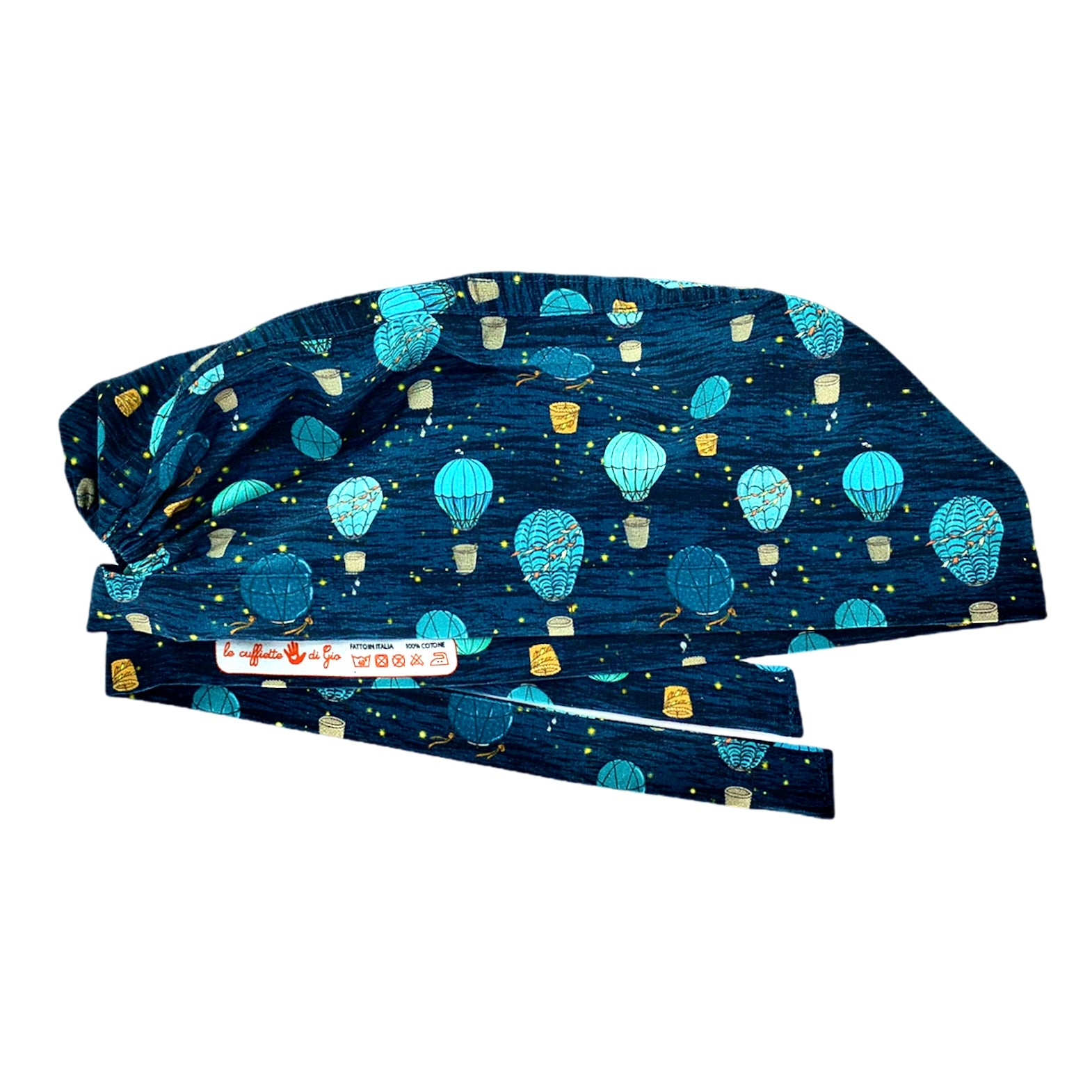Cuffietta chirurgica blu avio di paesaggio notturno con mongolfiere nei toni del turchese che viaggiano su un cielo notturno