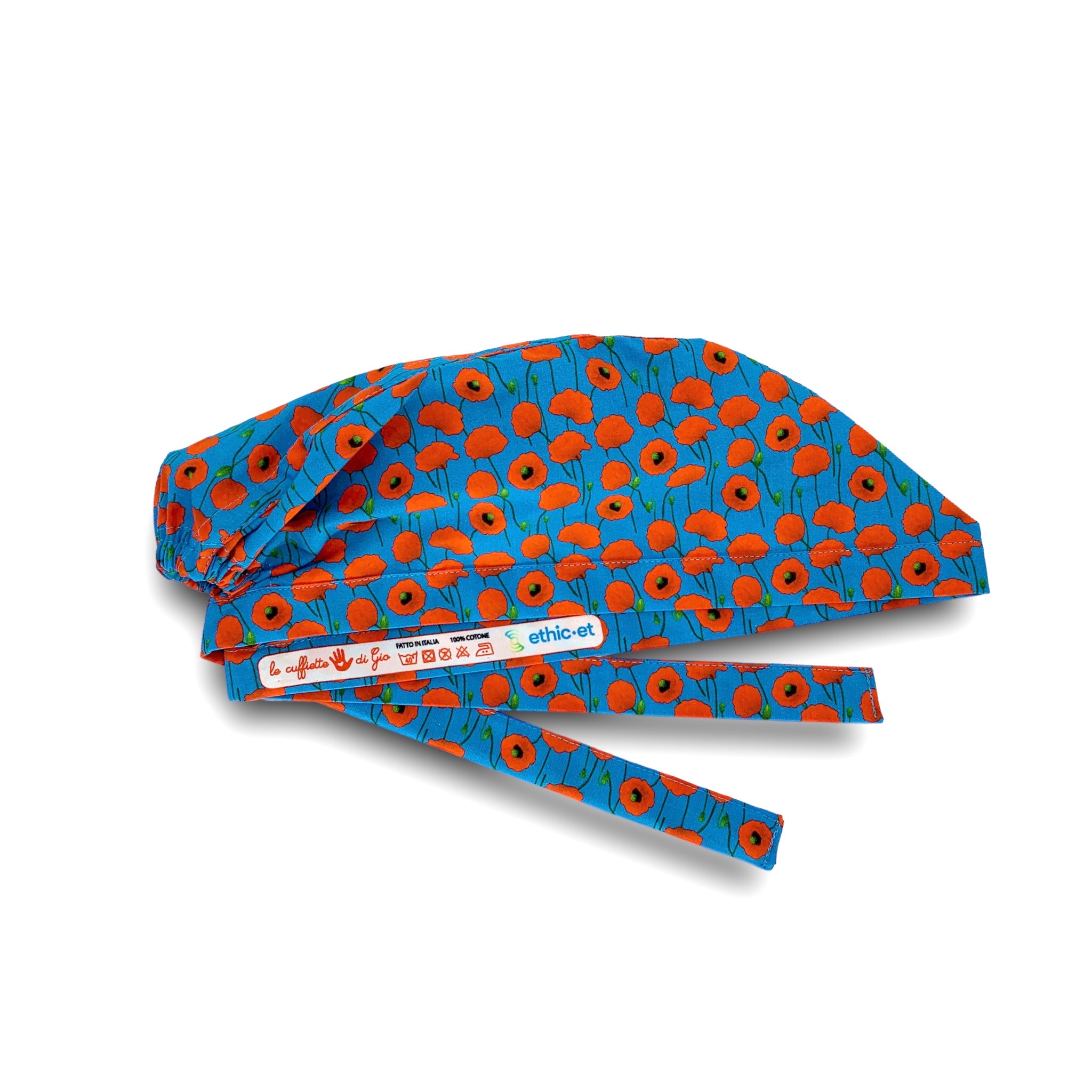 Cuffietta chirurgica azzurro intenso con piccoli papaveri rossi che cadono come pioggia