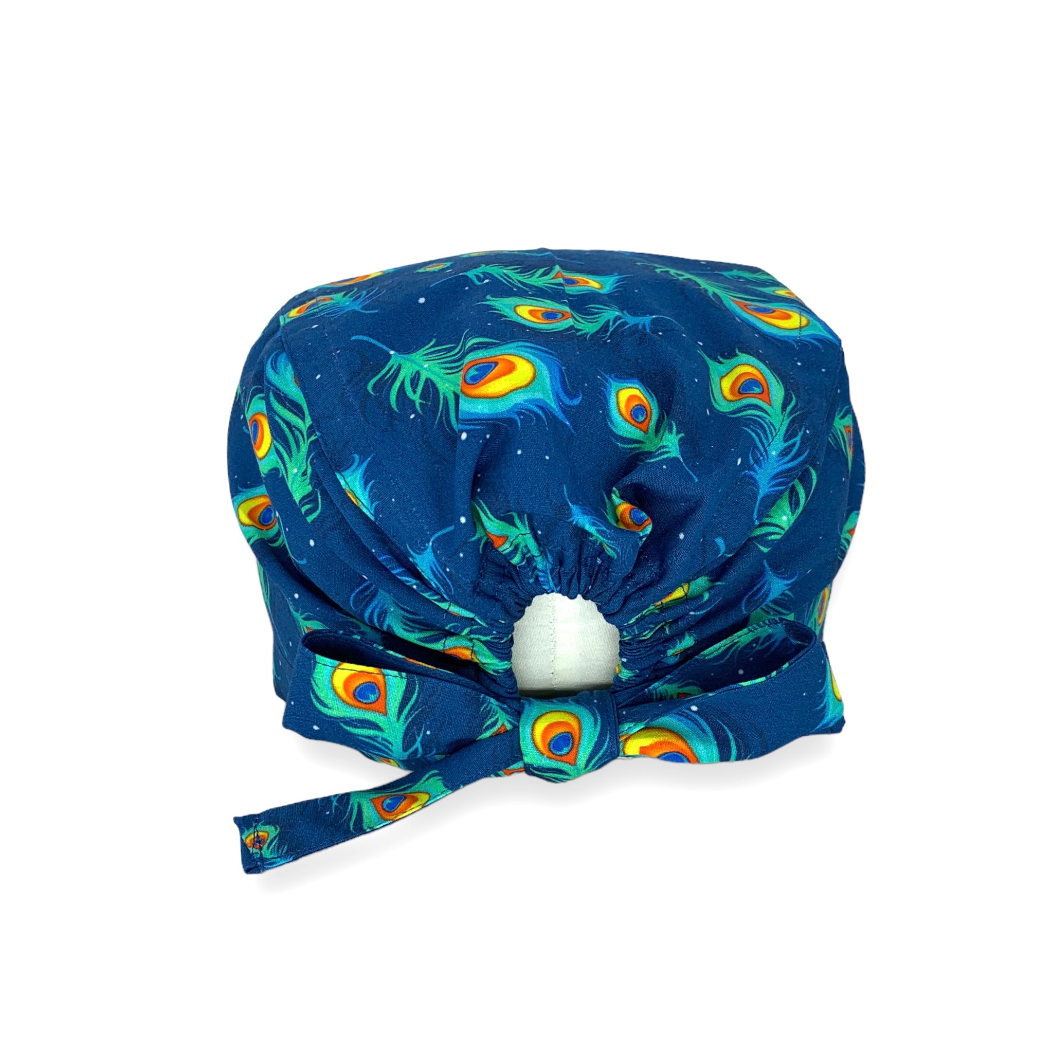 Cuffietta chirurgica blu medio con piume di pavone turchese con il centro giallo e arancione