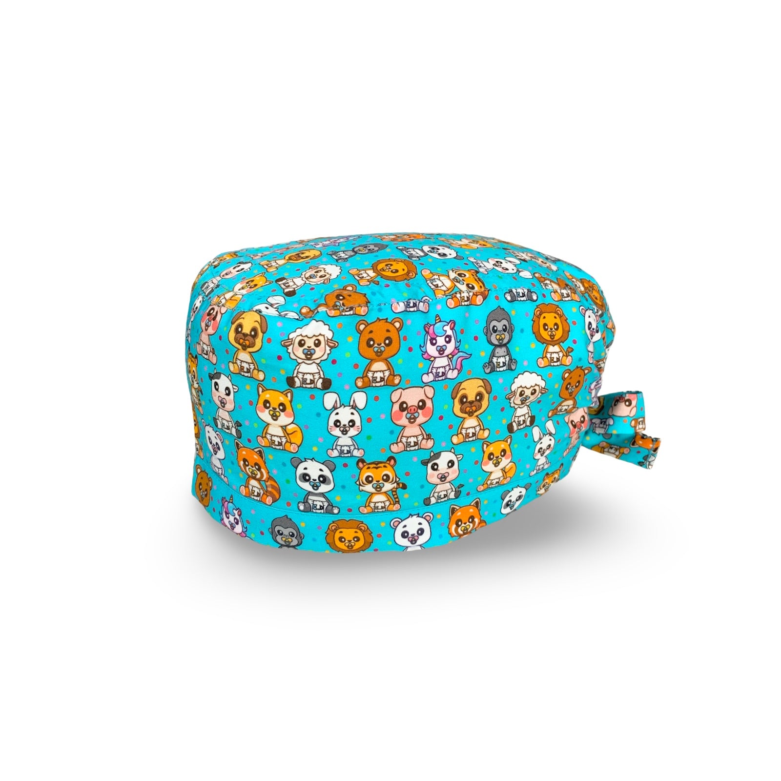 Una dose di dolcezza per questa cuffietta chirurgica con cuccioli di animali con ciuccio e pannolino su base azzurro. L'ideale per chi si occupa di nascita e maternità.