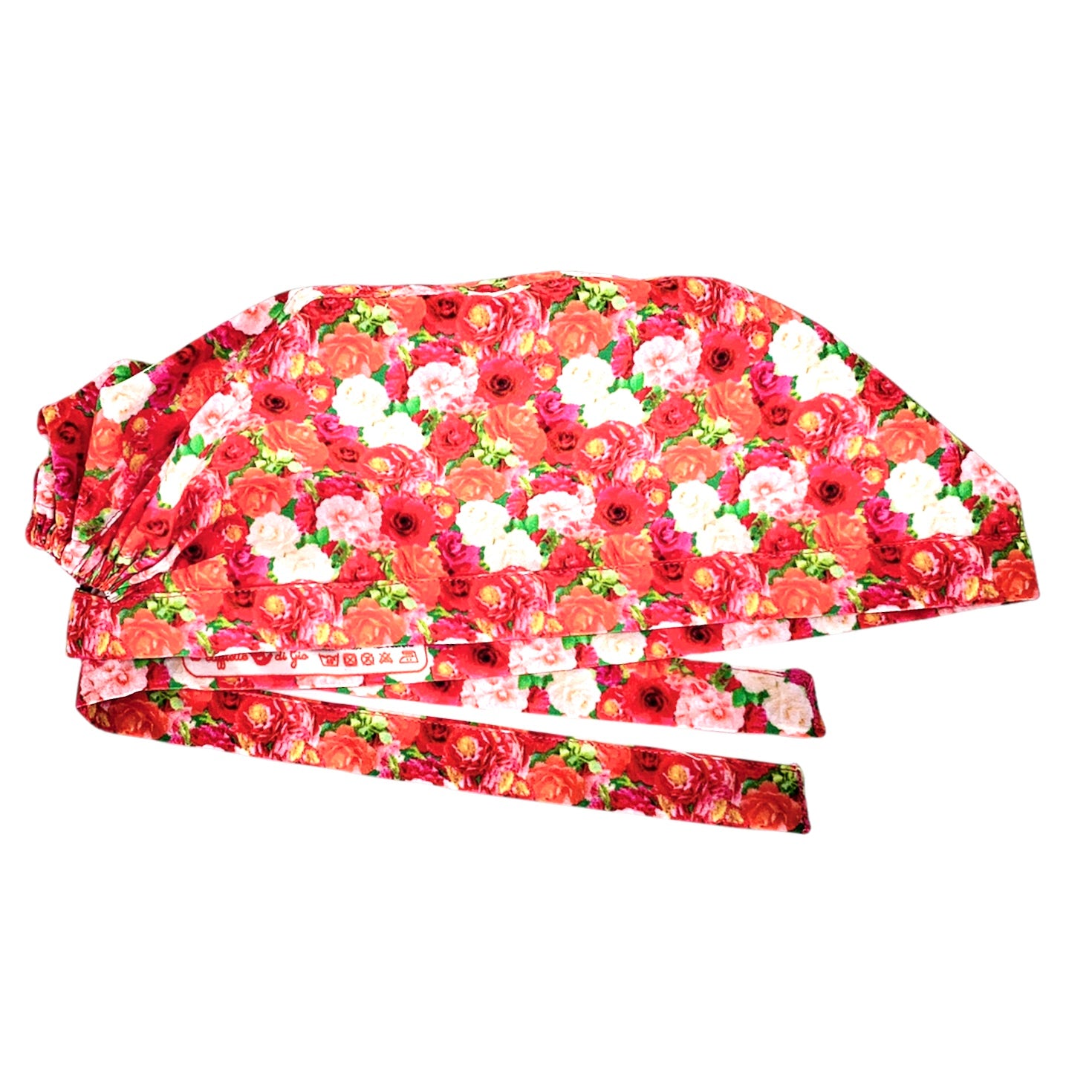 Cuffietta chirurgica con un tappeto di rose bianche rosa e arancione, fucsia, colori caldi, raffinato ed energizzante