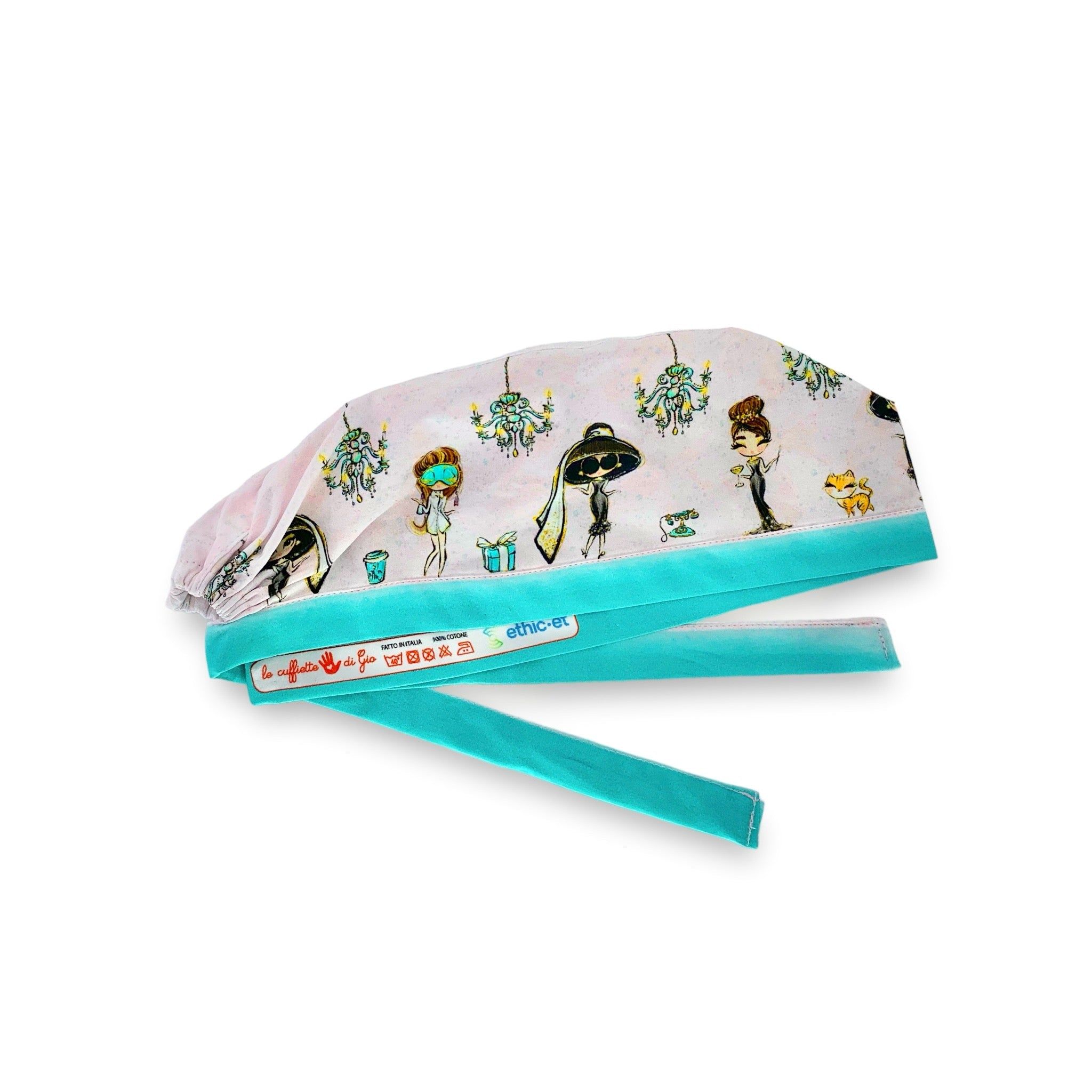 Una deliziosa rappresentazione di Miss Golightly, protagonista assoluta del celeberrimo film Colazione da Tiffany. Straordinaria la combinazione di colori rosa e verde tiffany