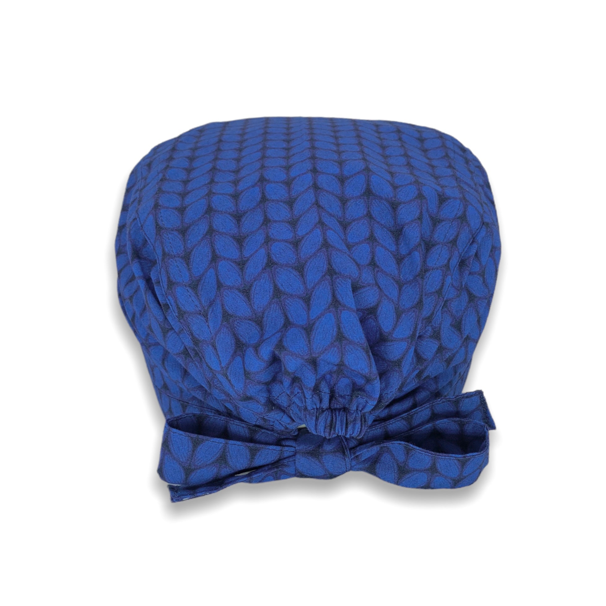 Una stampa che riproduce il lavoro a maglia, sfondo blu cobalto