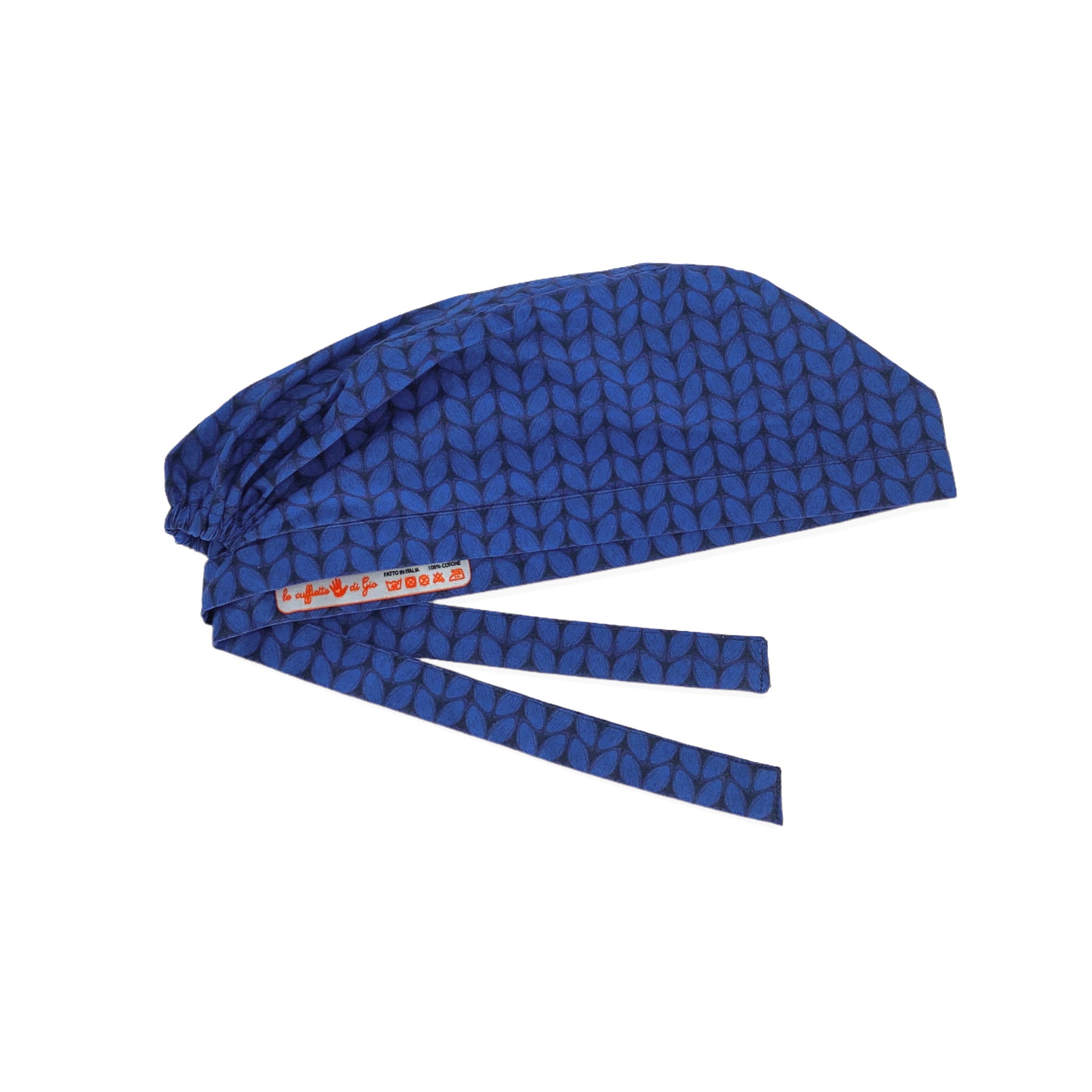 Una stampa che riproduce il lavoro a maglia, sfondo blu cobalto