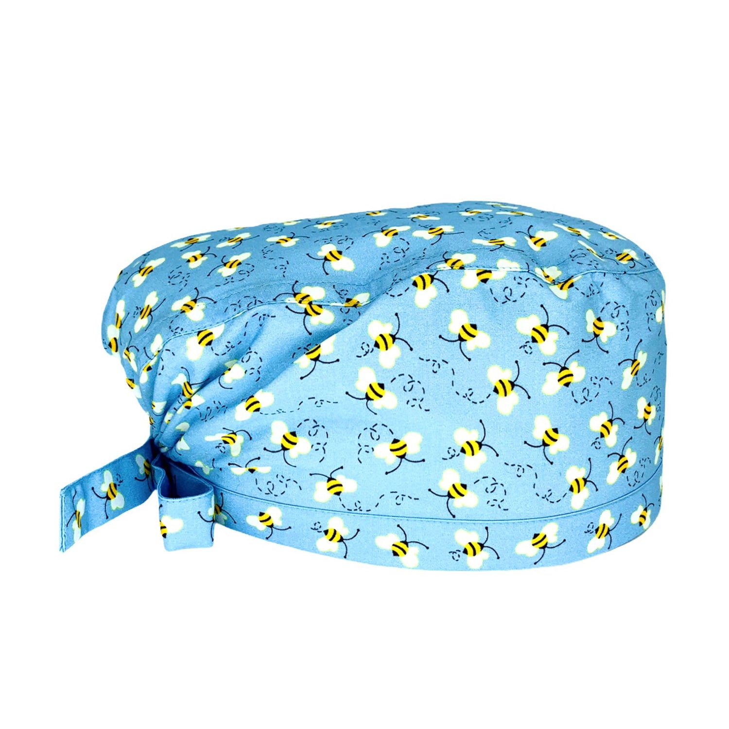 Immagine laterale di cuffia medica. Su fondo azzurro tante delicate api svolazzanti stampate.