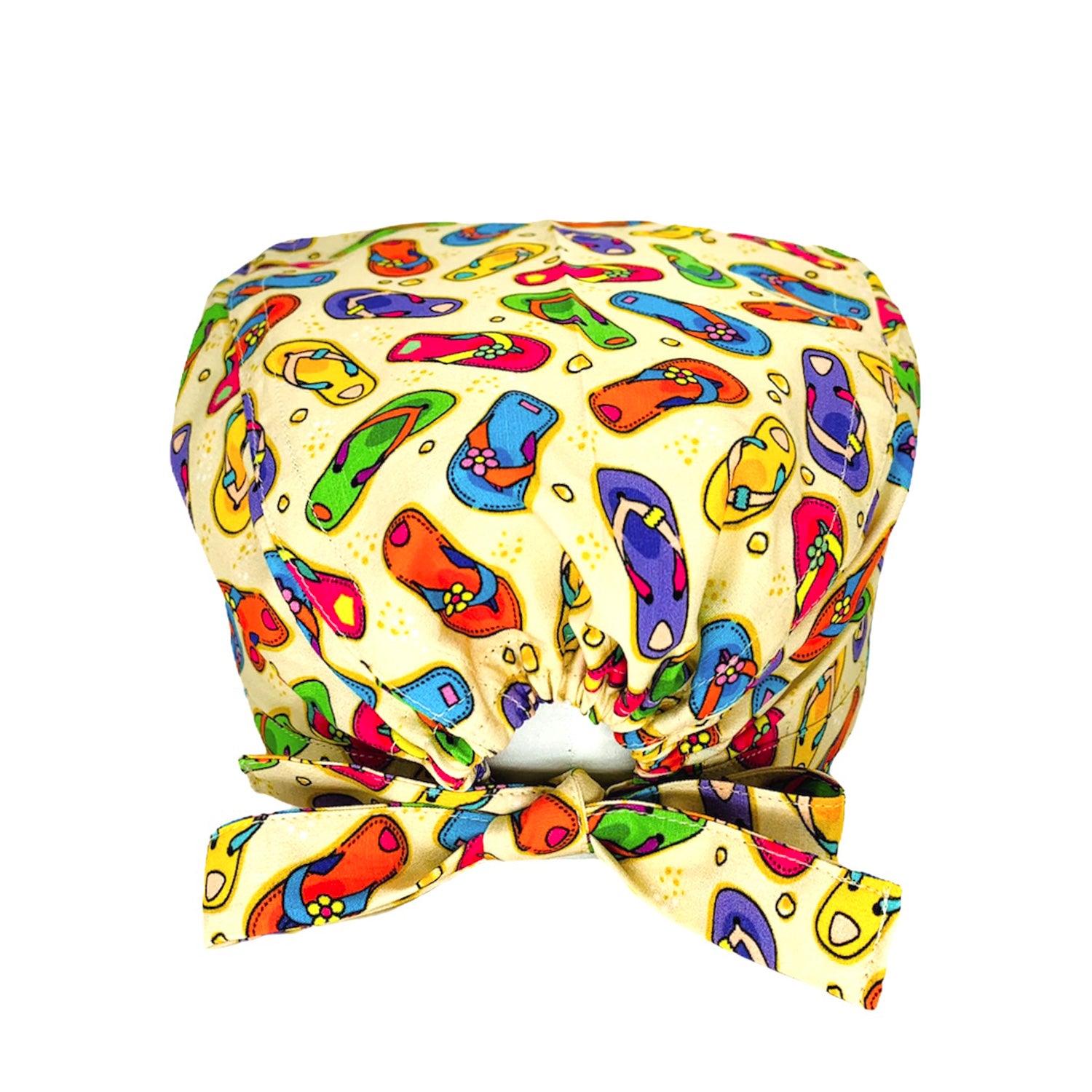 Quando la voglia di andare al mare diventa irresistibile, immaginati già lì con questa fantasia tempestata di coloratissime ciabattine infradito. Sfondo beige