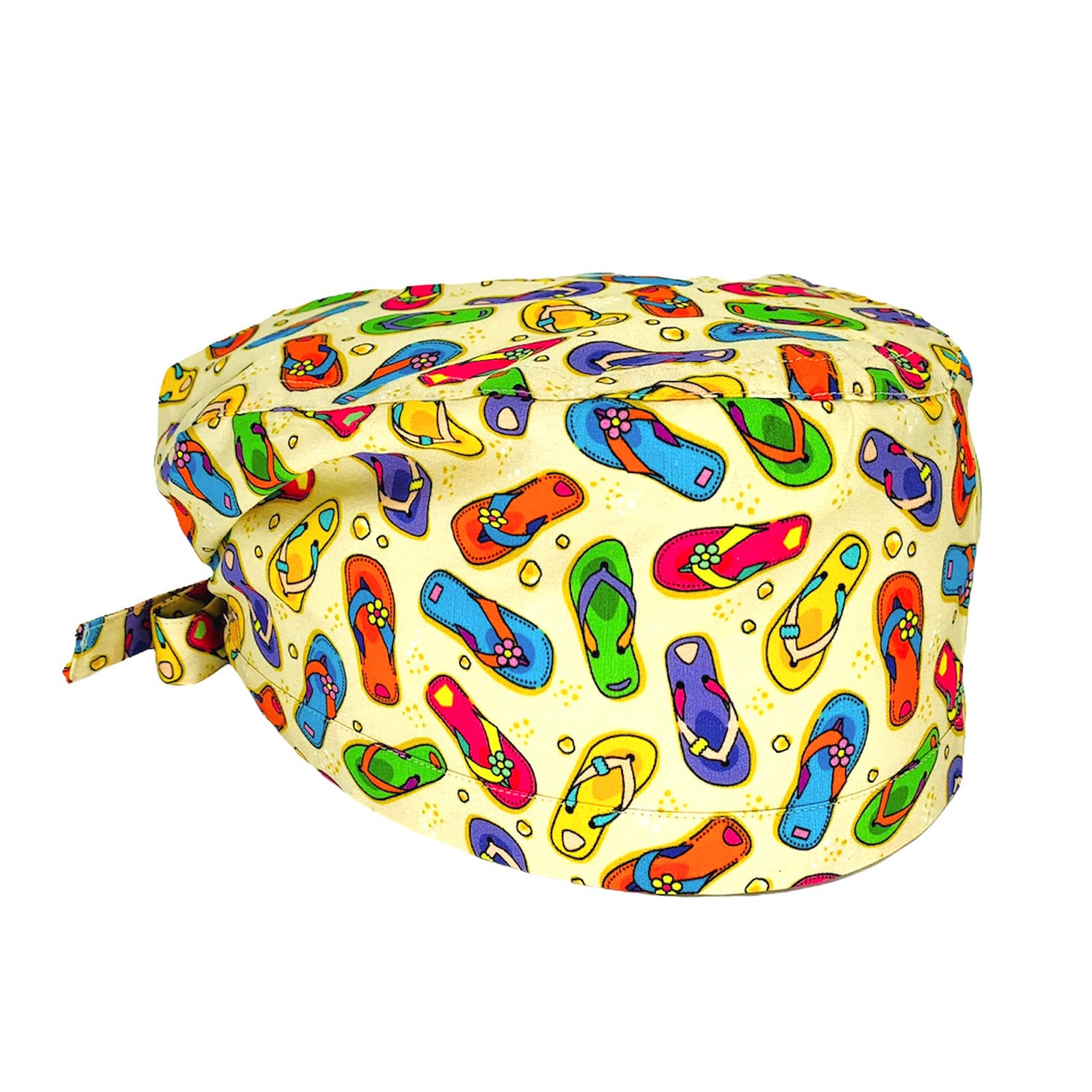 Quando la voglia di andare al mare diventa irresistibile, immaginati già lì con questa fantasia tempestata di coloratissime ciabattine infradito. Sfondo beige