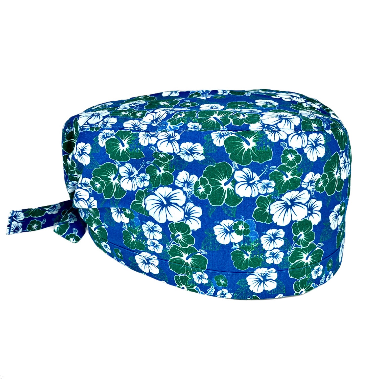 Cuffietta chirurgica con fiori hawaiiani bianchi e verdi su base blu medio