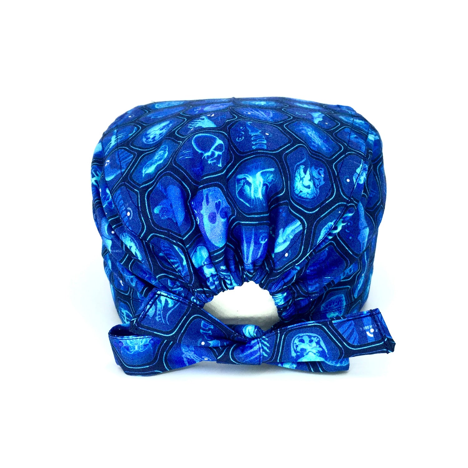 Cuffietta con immagini radiologiche di varie parti del corpo umano con effetto raggi X su cuffietta a sfondo blu.