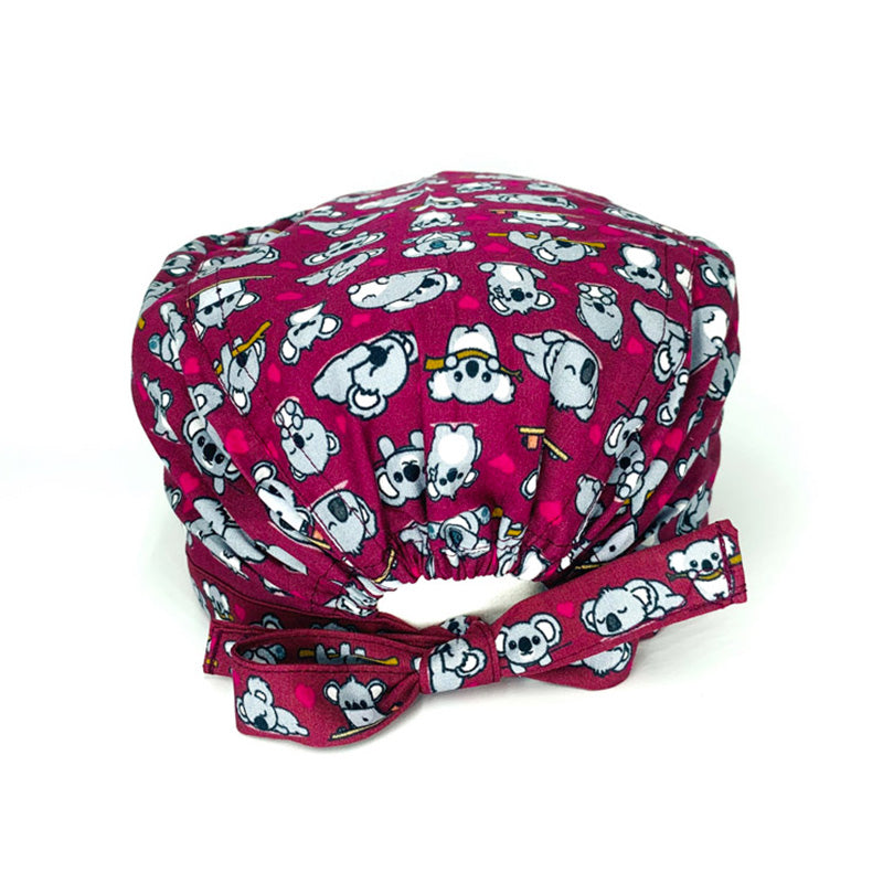 Un bestseller assoluto! Mille tenerissimi koala grigi e cuoricini magenta si sposano alla perfezione con il bordeaux di sfondo che abbiamo scelto per illuminare il tuo outfit lavorativo