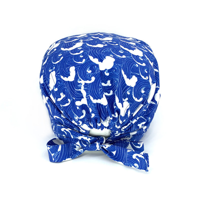 Cuffietta chirurgica con onde del mare disegnate in stile giapponese; onde bianche su blu indaco; tema marino classico e molto elegante