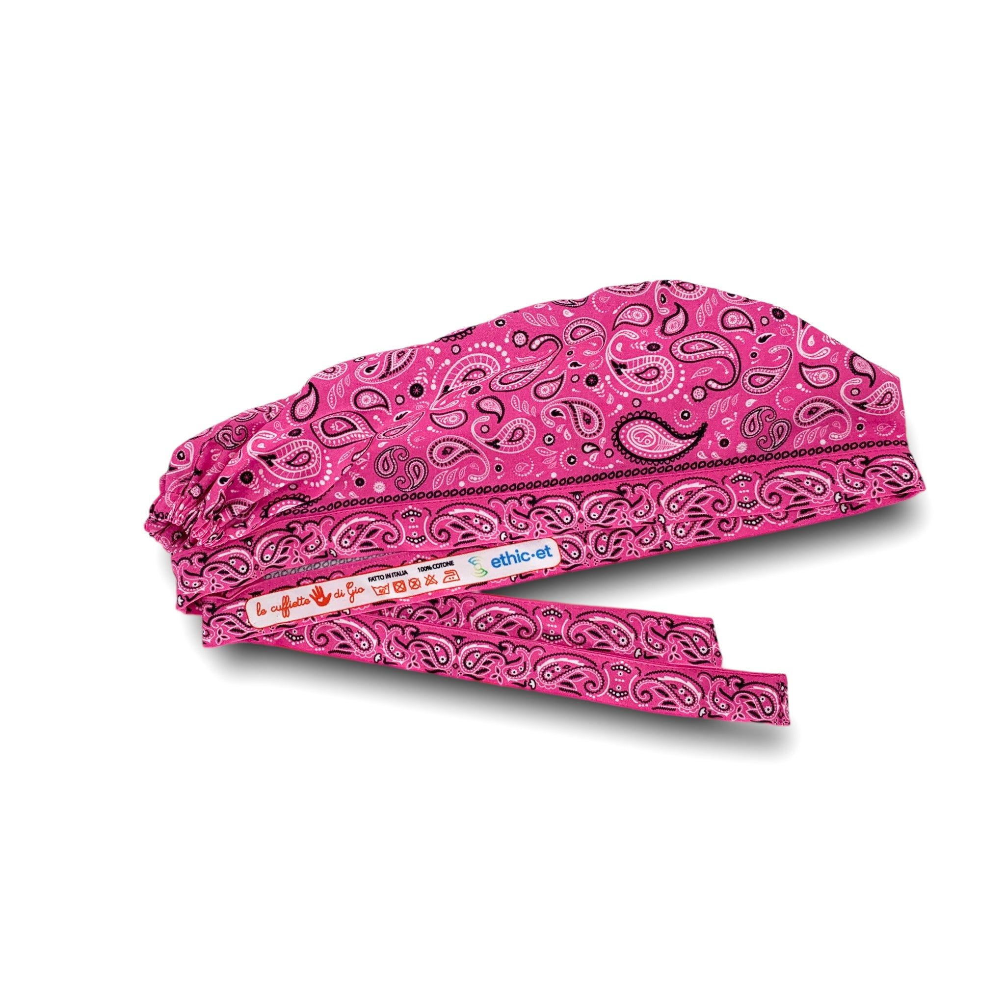 Una classica fantasia Paisley, perfettamente incorniciata dalla fascetta inferiore su sfondo fucsia