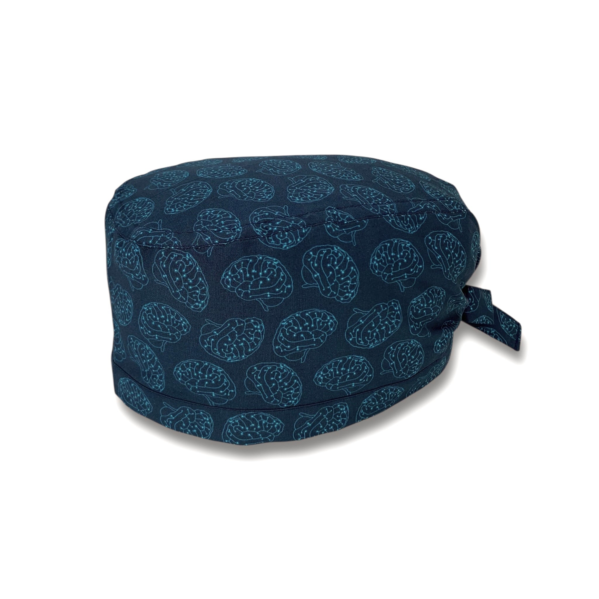 Una cuffietta chirurgica dedicata alla neurochirurgia: il cervello stilizzato in versione elettronica in colore azzurro su sfondo blu scuro