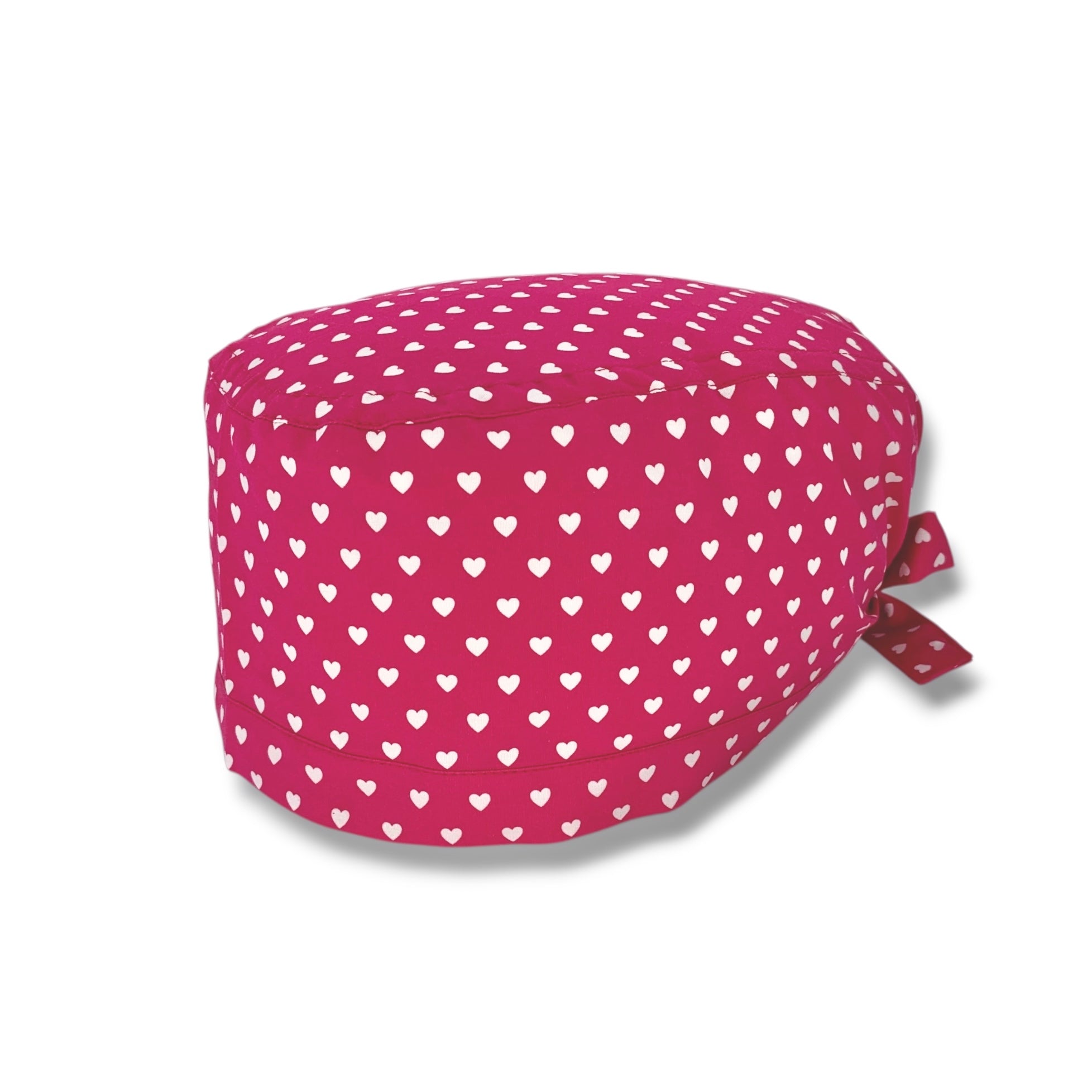 Piccoli cuoricini bianchi come pois su base magenta. Semplice ed elegante.