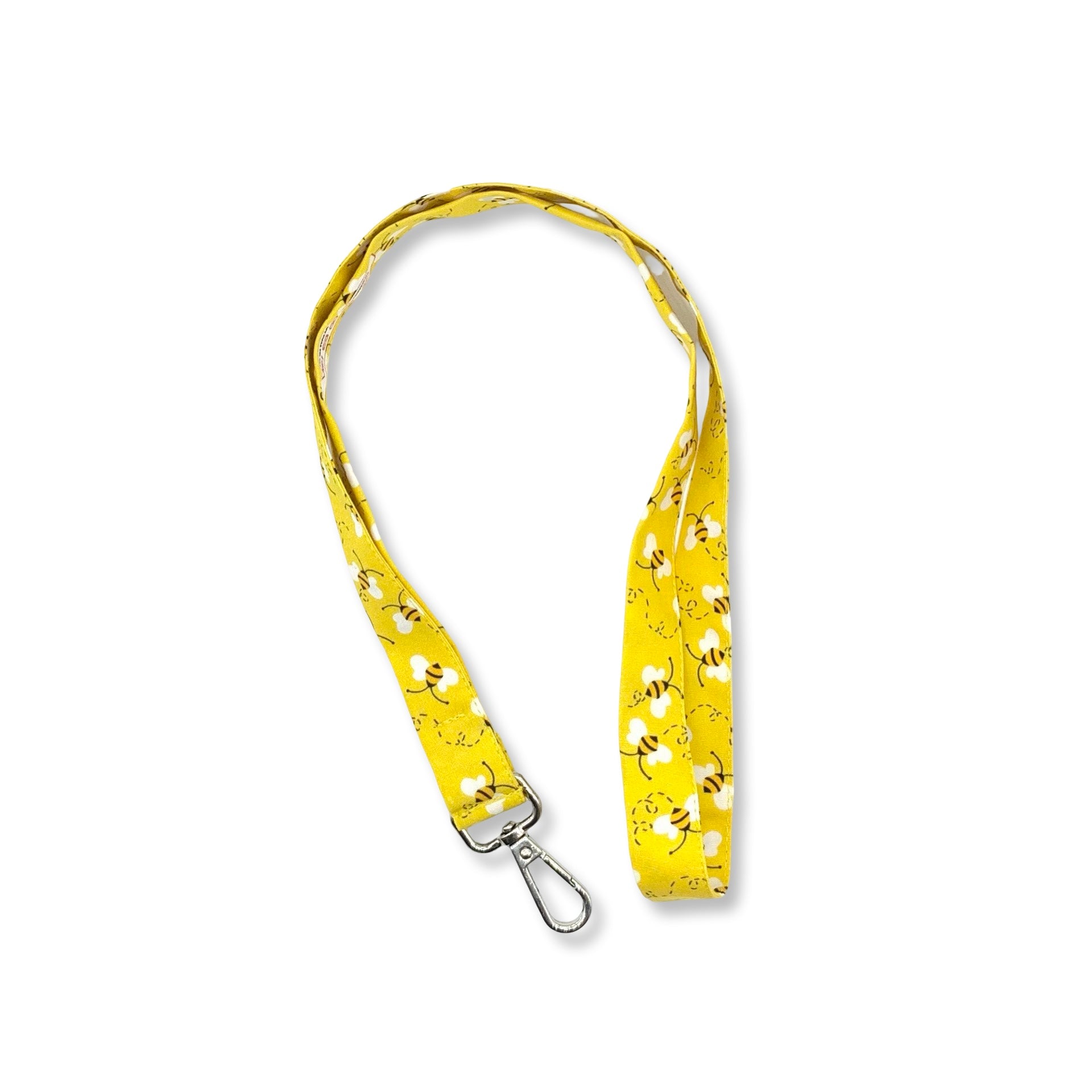 Una fascetta da collo portabadge con tante delicate apine svolazzanti su sfondo  giallo, lunga 45 cm e corredata di moschettone in metallo separabile per il lavaggio grazie al bottone automatico