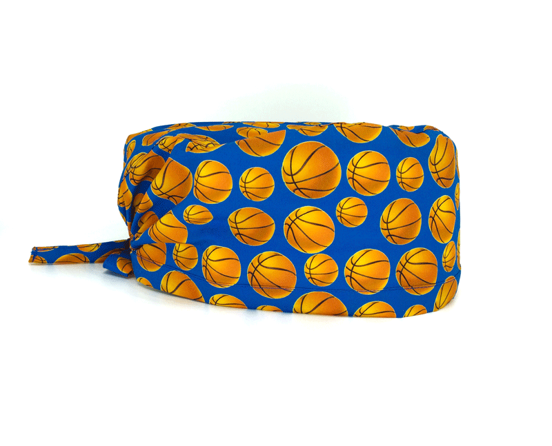 La cuffietta ideale per gli appassionati del basket, tanti palloni arancioni su base blu cobalto